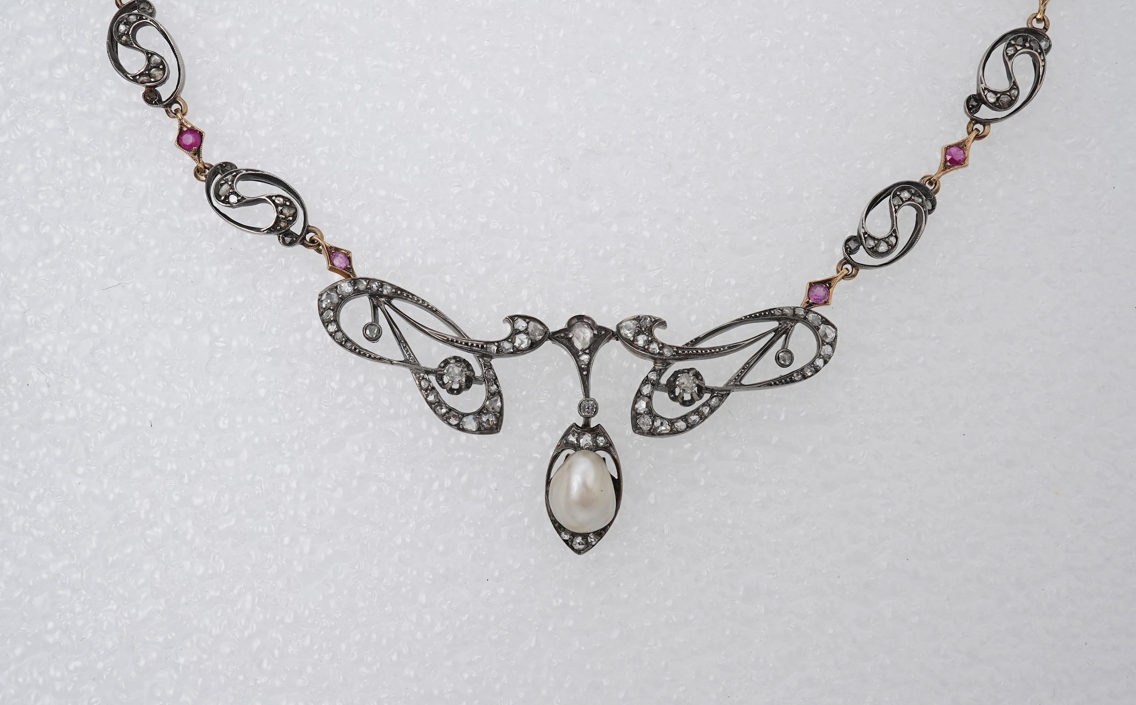 An Art Nouveau ruby, pearl and diamond necklace, France, early 20th century